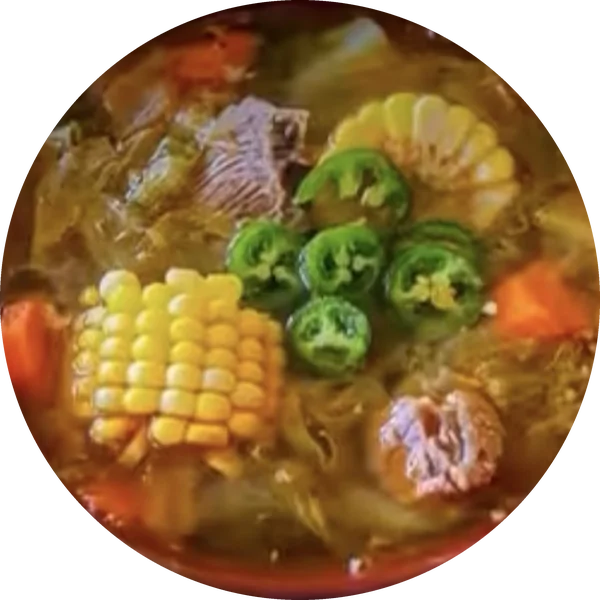 Beef soup with corn, carrots and jalapeños